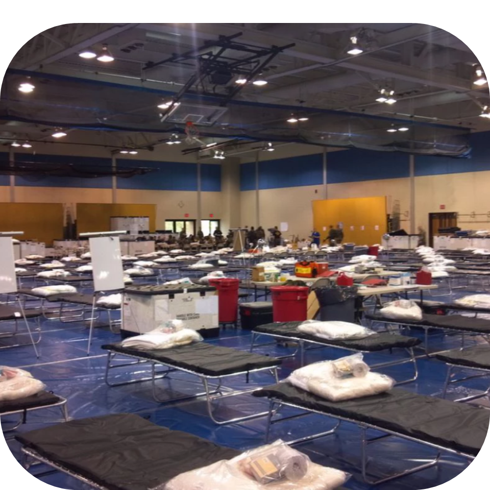 Mobile surge beds set up in a gymnasium