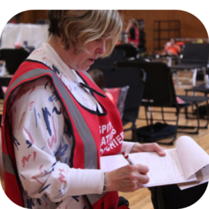 Emergency preparedness team member taking inventory during a preparedness exercise